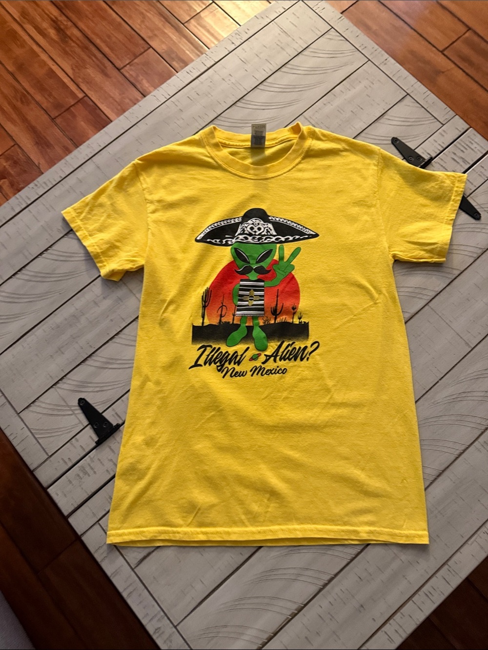 Yellow Graphic Tee — "Illegal Alien? New Mexico"